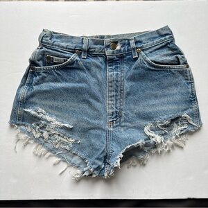 25”W Lee High-Rise Distressed Denim Shorts in Light Blue